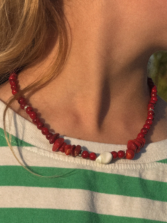 the leader necklace in sunburn