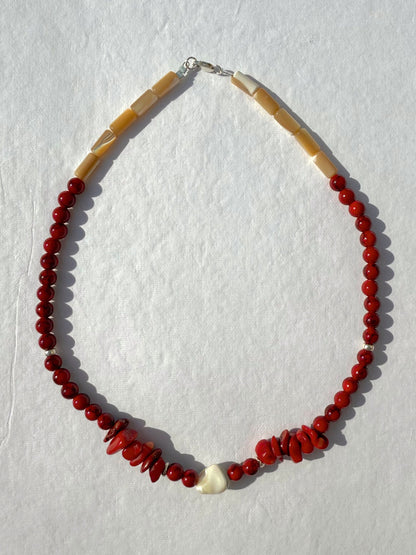 necklace made of red coral and mother of pearl with shell detail and sterling closures. 